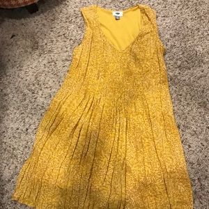 Mid-length yellow with tan flowers dress
